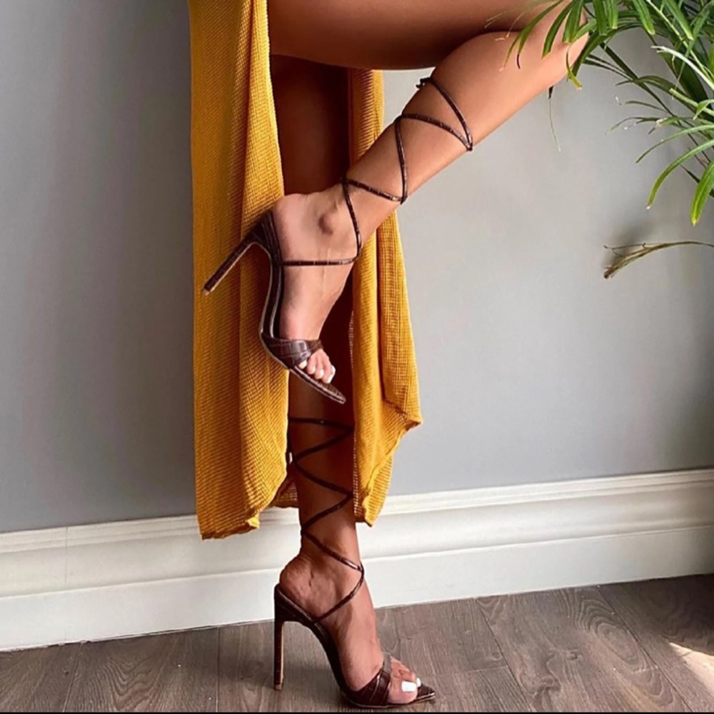 Brown Textured Wrap up Heels with pointed toe.